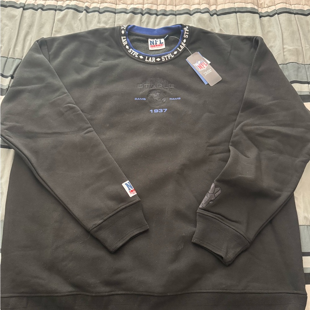 Men's NFL x Staple Black Los Angeles Rams Globe Crewneck Pullover